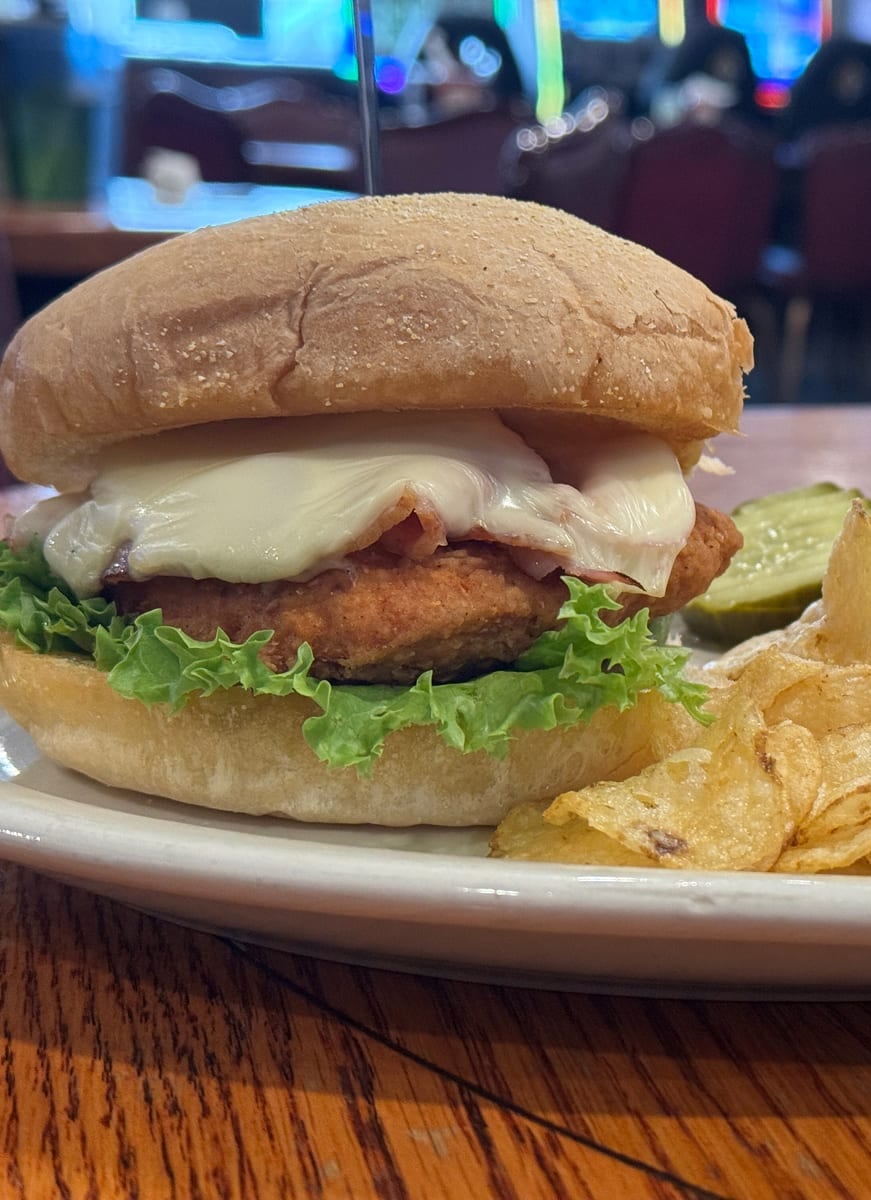 Chicken Cordon Bleu sandwich with fries at Pastimes